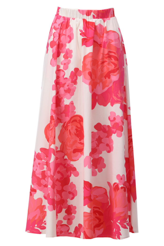 Flowing maxi skirt with bold red and pink floral print, elastic waistband, and flattering silhouette for summer styling