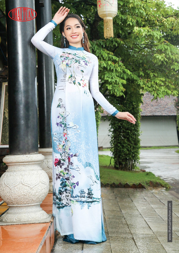 Made-to-measure ao dai by Mark&Vy using high quality, Thai Tuan fabric. Stunning, Snow scene/pagoda motif.
