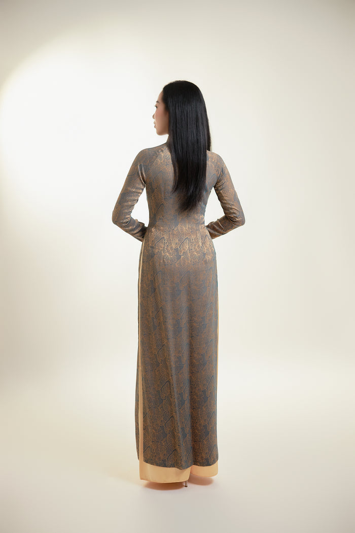 Thai Tuan Silk Brocade Ao Dai with Black and Gold Floral Pattern