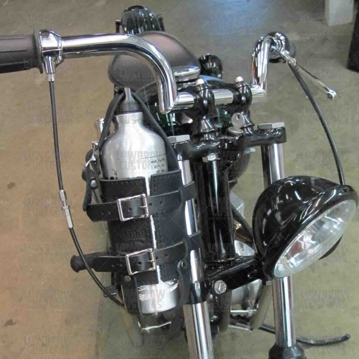 Add a piece of mind to your ride with the FB01 spare fuel gas bottle carrier. Hand crafted in USA with premium leather and top quality hardware. Durable and stylish, it's the perfect fit for your motorcycle.