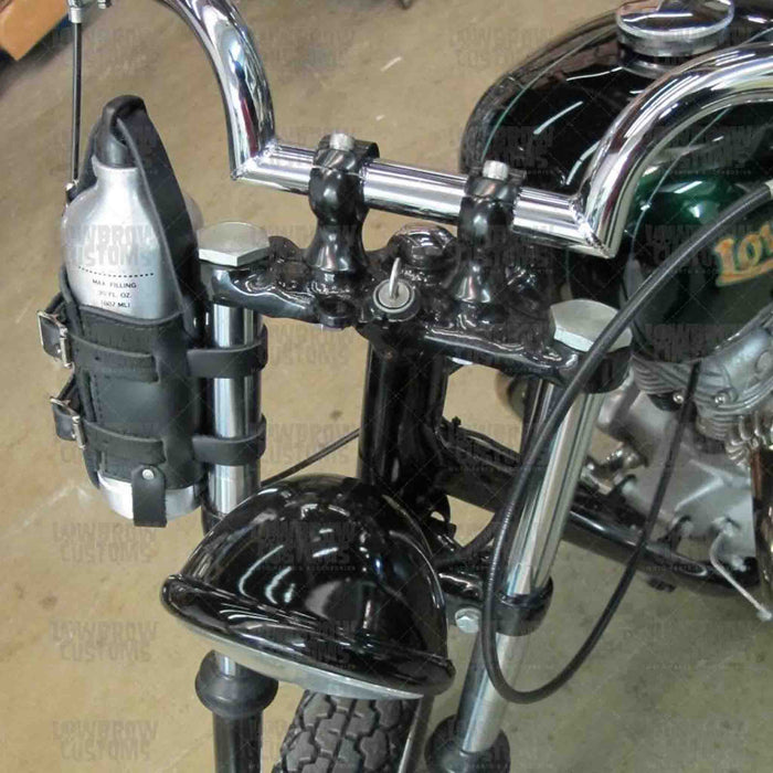 Add a piece of mind to your ride with the FB01 spare fuel gas bottle carrier. Hand crafted in USA with premium leather and top quality hardware. Durable and stylish, it's the perfect fit for your motorcycle.