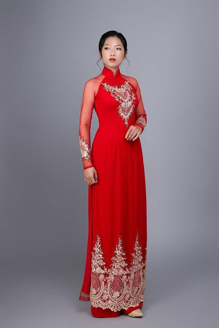 Wedding ao dai in red chiffon fabric. Features beautiful hand beading.