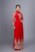 Wedding ao dai in red chiffon fabric. Features beautiful hand beading.